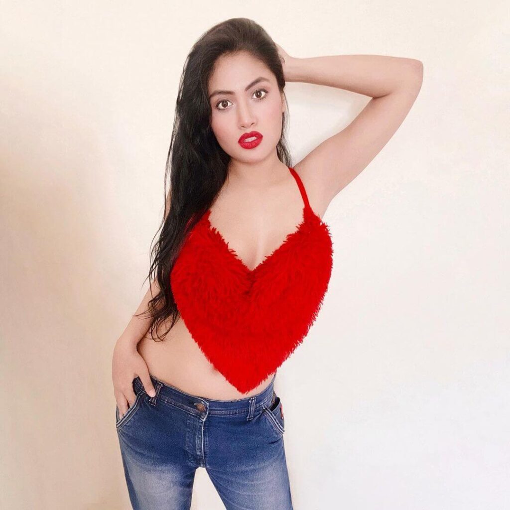 Actress Manvi Chugh in red sexy outfit