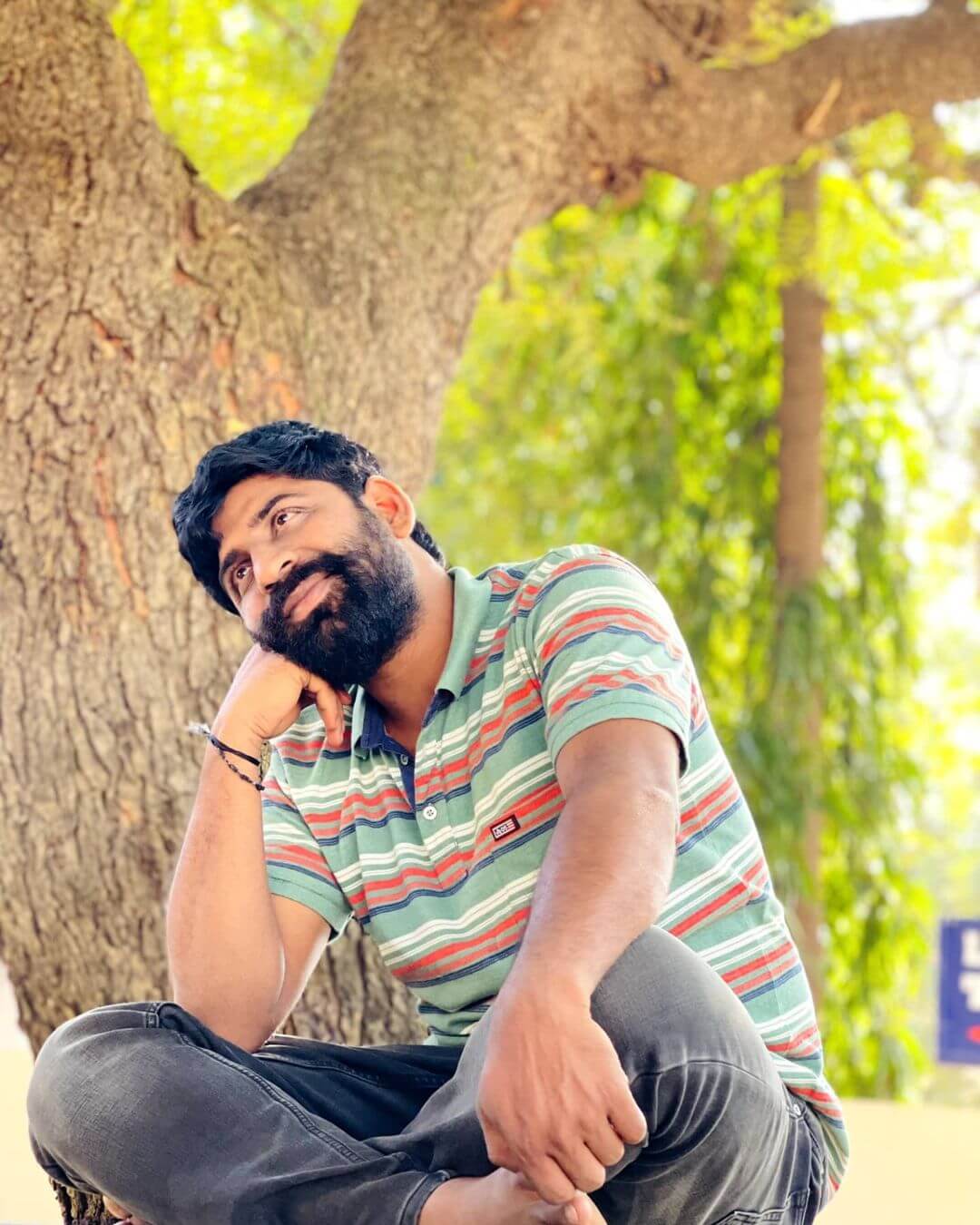 Rajkumar Kasi under a tree sitting