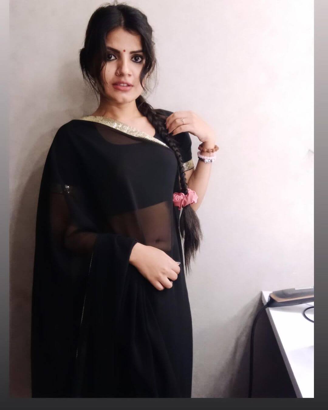 Actress Shaifali Rajpoot in black saree