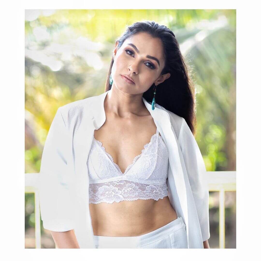 Actress Andrea Jeremiah in sexy white bra and coat
