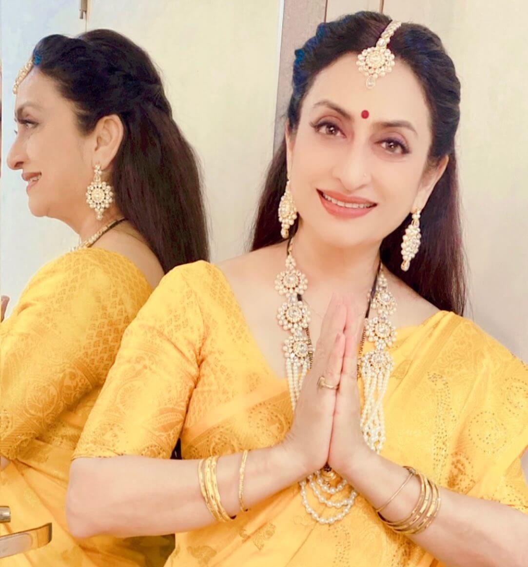 Actress Navni Parihar close up shot in yellow saree