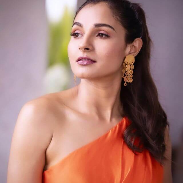 Actress Andrea Jeremiah sexy close up shot in orange outfit