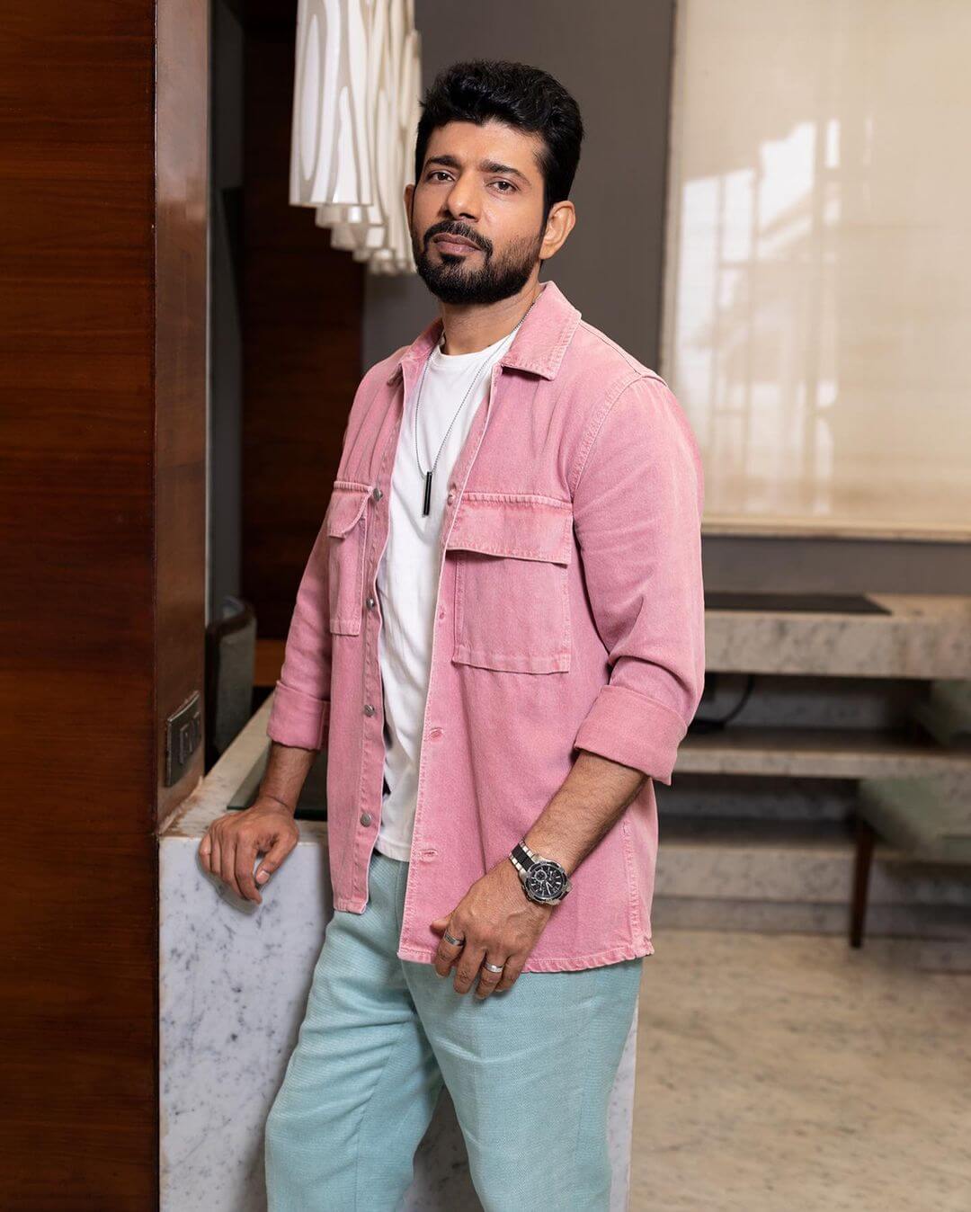 Actor Vineet Kumar Singh stylish shot in pink jacket