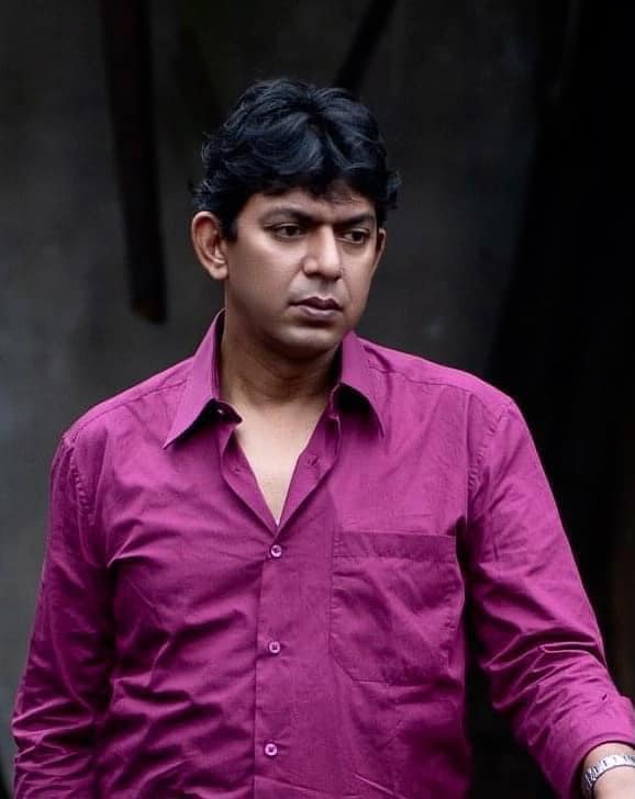 Actor Chanchal Chowdhury in pink shirt