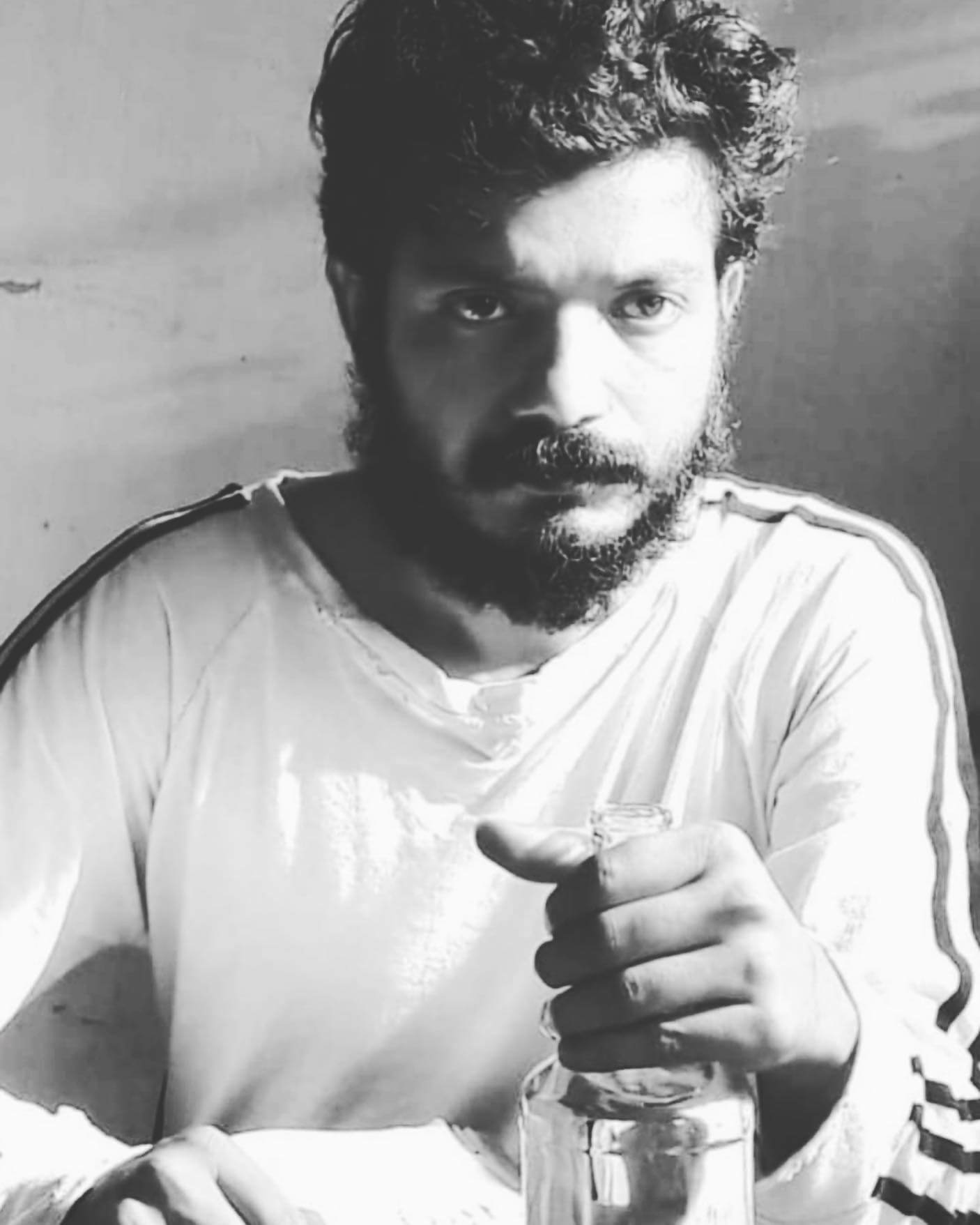 Actor Sreenath Bhasi black and white close up