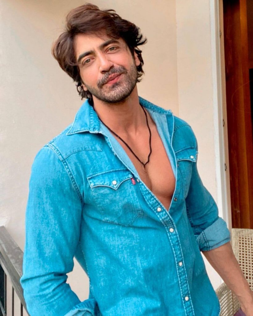 Actor Karanveer Khullar close up in sky blue shirt
