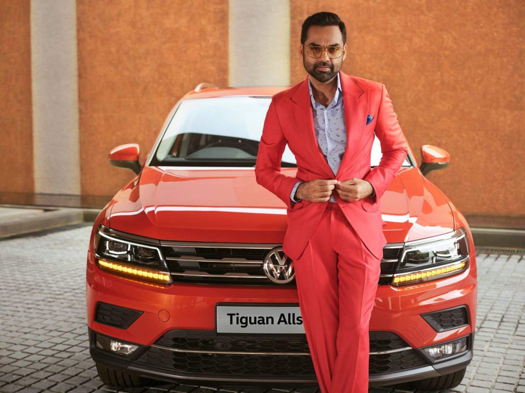 Actor Abhay Deol in red suit