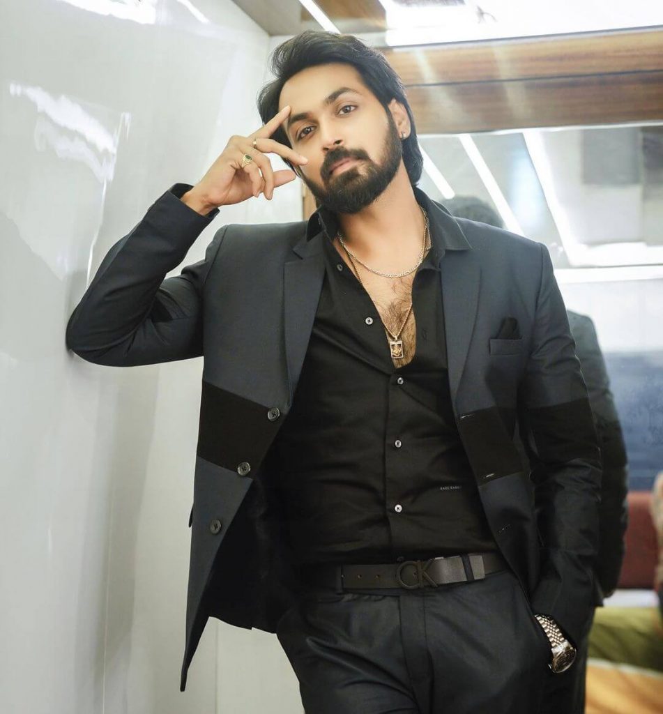 Actor Maanas Nagulapalli in black outfit