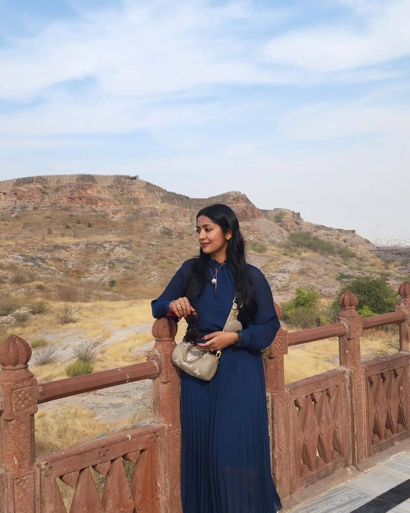 Actress Navya Nair in teal blue attire