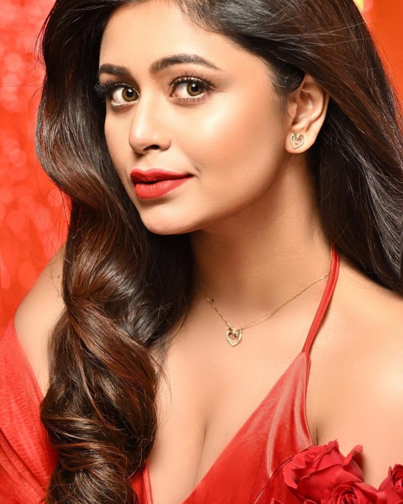 Actress Ritabhari Chakraborty in sexy red sleeveless gown