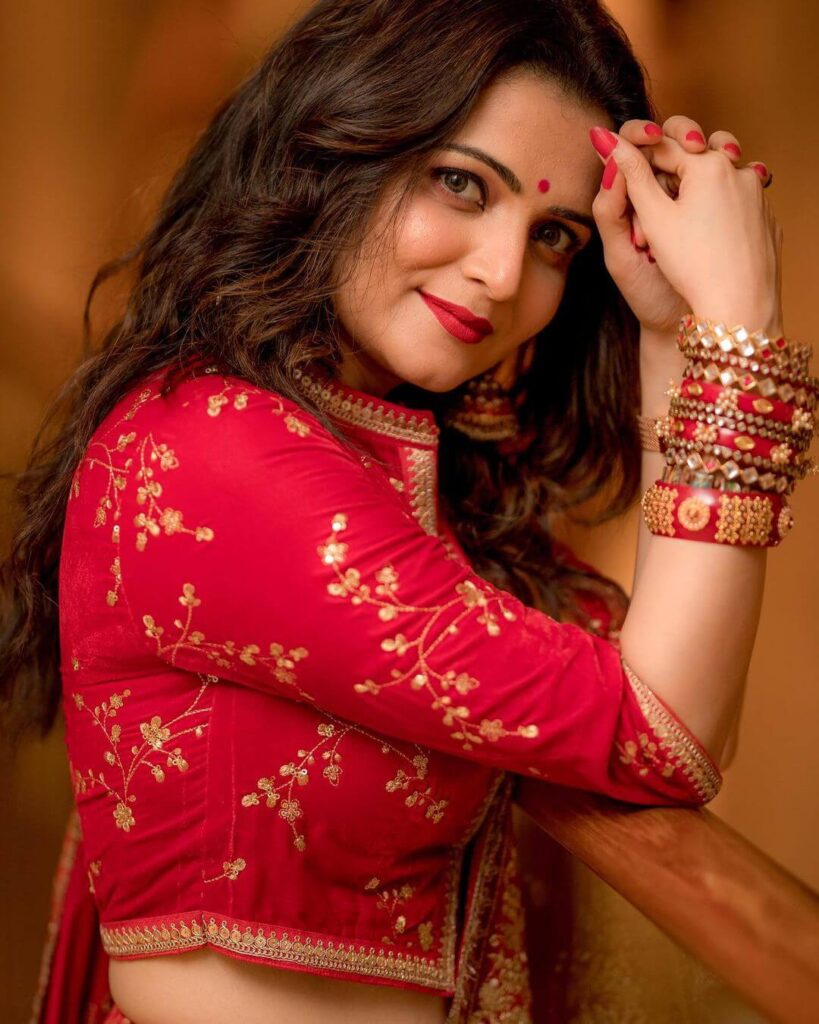 Dhivyadharshini in red outfit