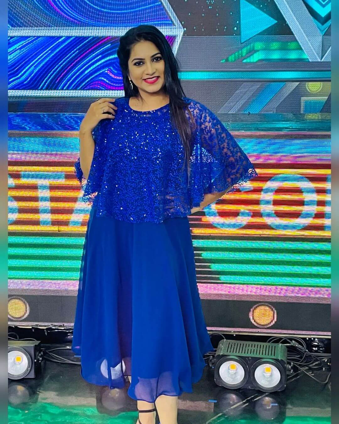 Actress Ankhitha Vinod in dark blue gown