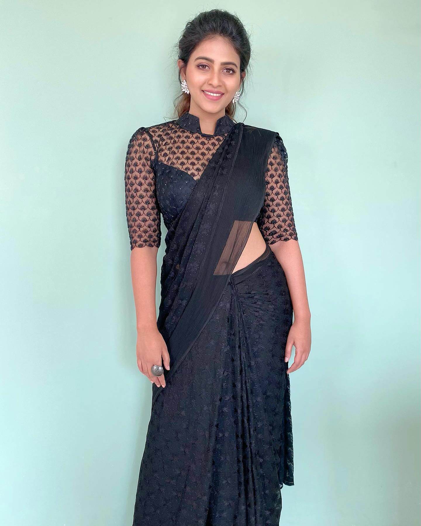 Anjal in sexy black saree