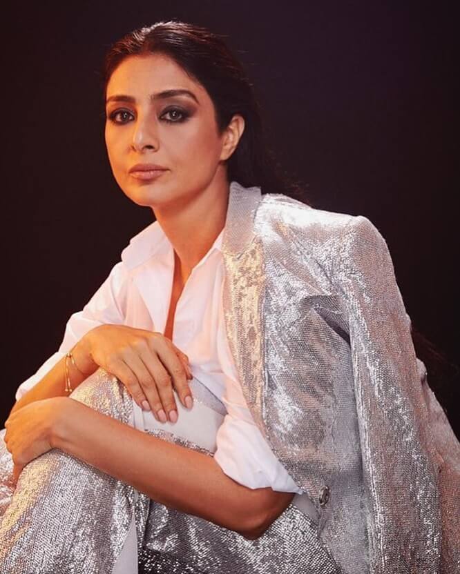 Tabu close up shot in white outfit