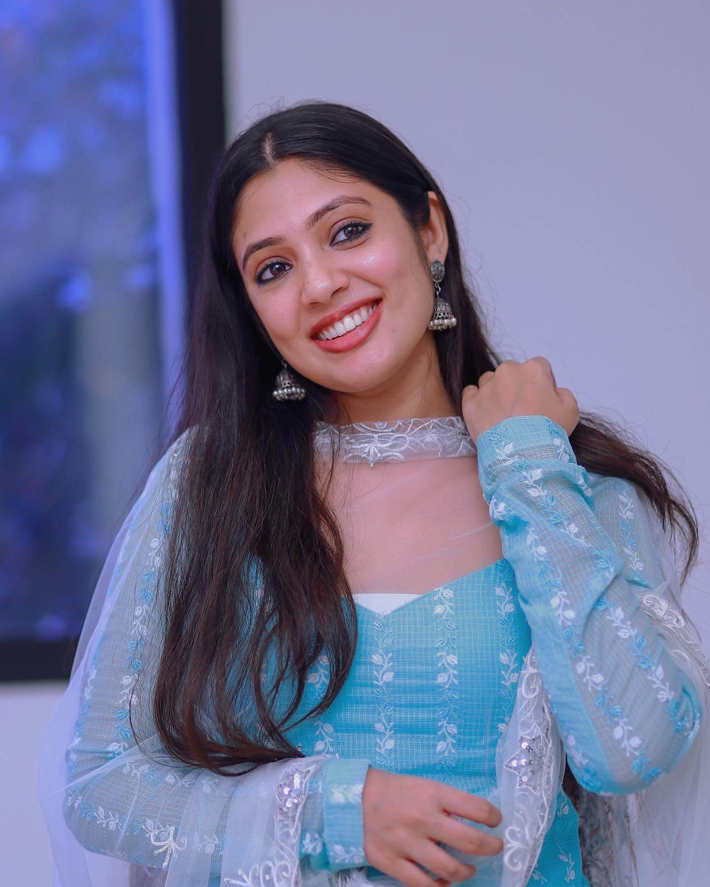 Veena Nandakumar light blue outfit