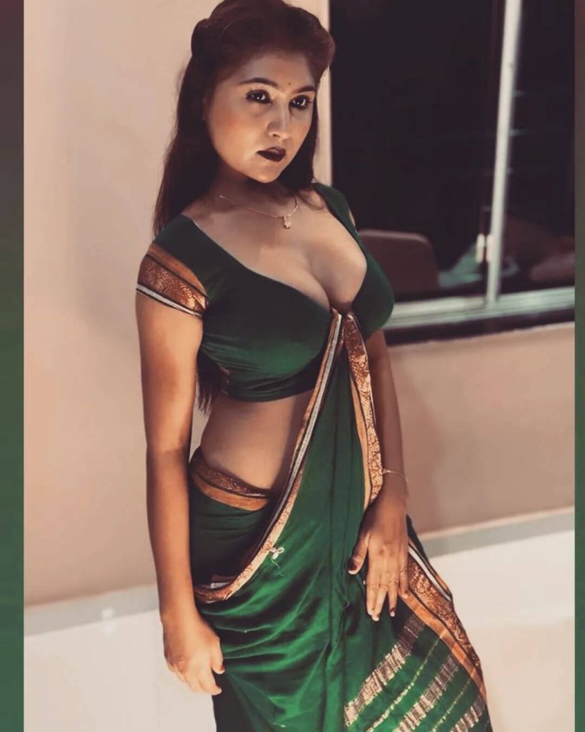 Actress Hiral Radadiya in sexy dark green outfit