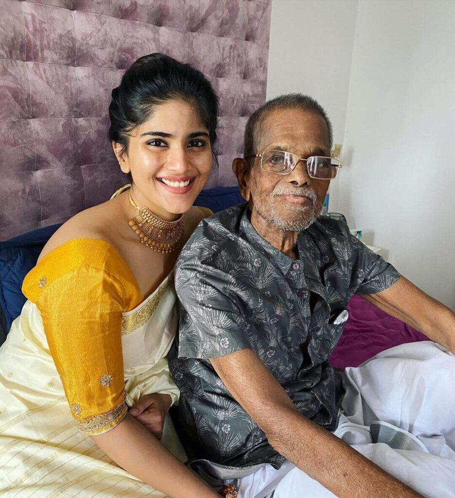 Megha Akash with grandfather