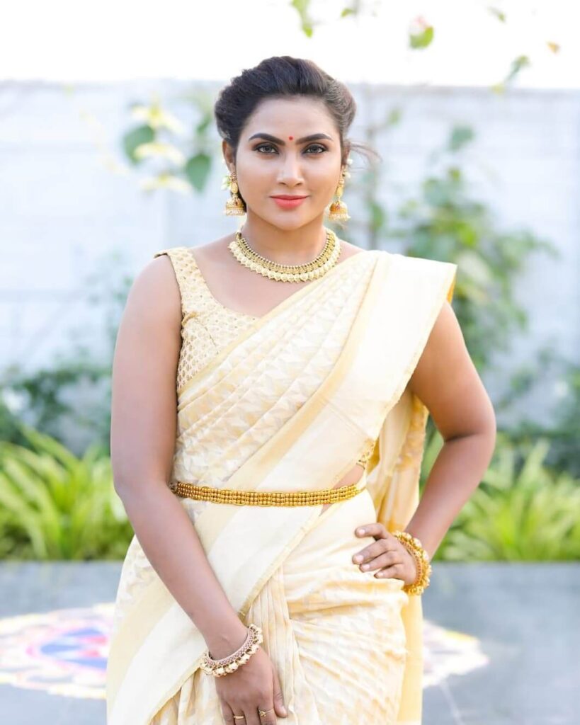 Myna Nandini in saree and sleeveless blows