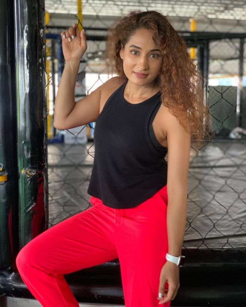 Pooja Ramachandran in sexy workout black top