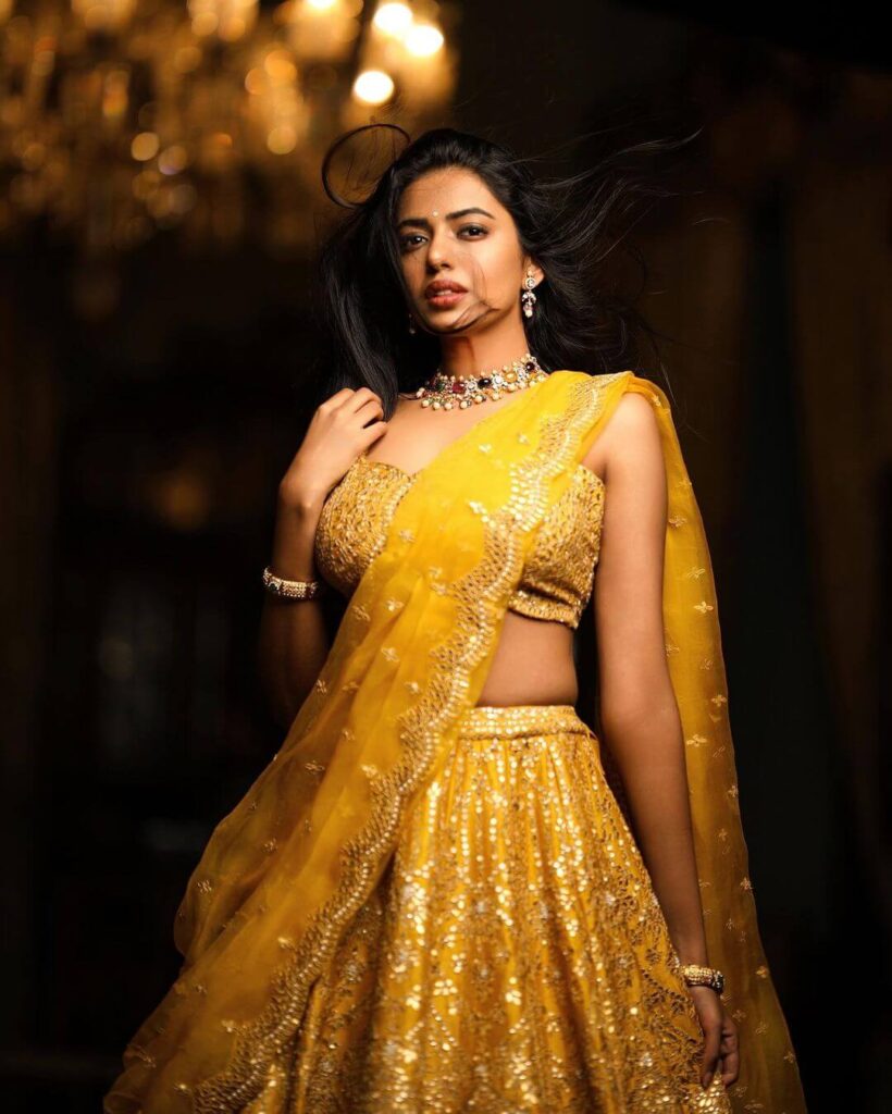 Shivani Rajashekar in yellow traditional dress