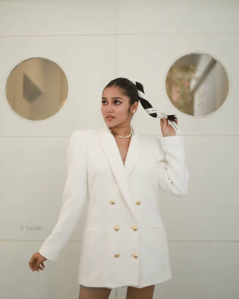 Anikha Surendran in white suit