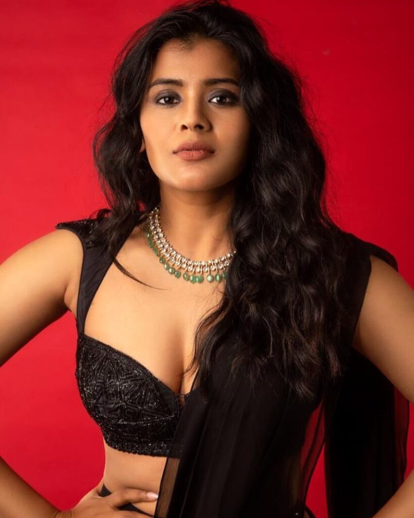Hebah Patel close up in sexy black dress