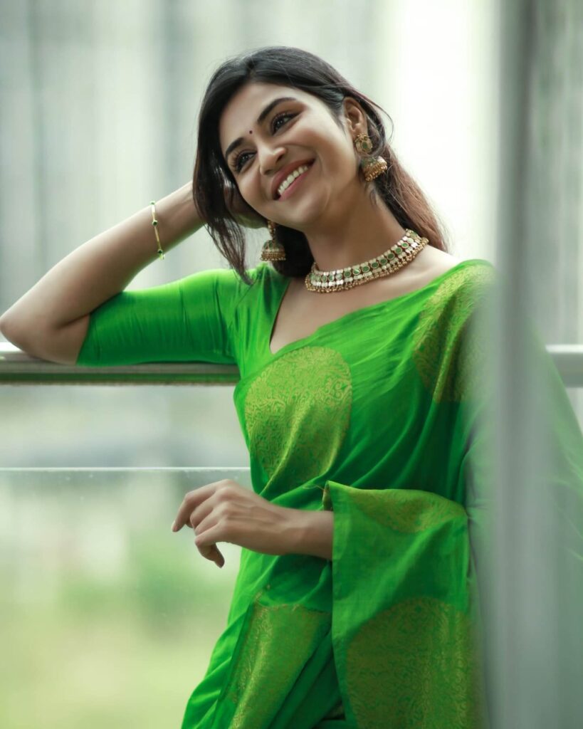 Indhuja Ravichandran in green saree