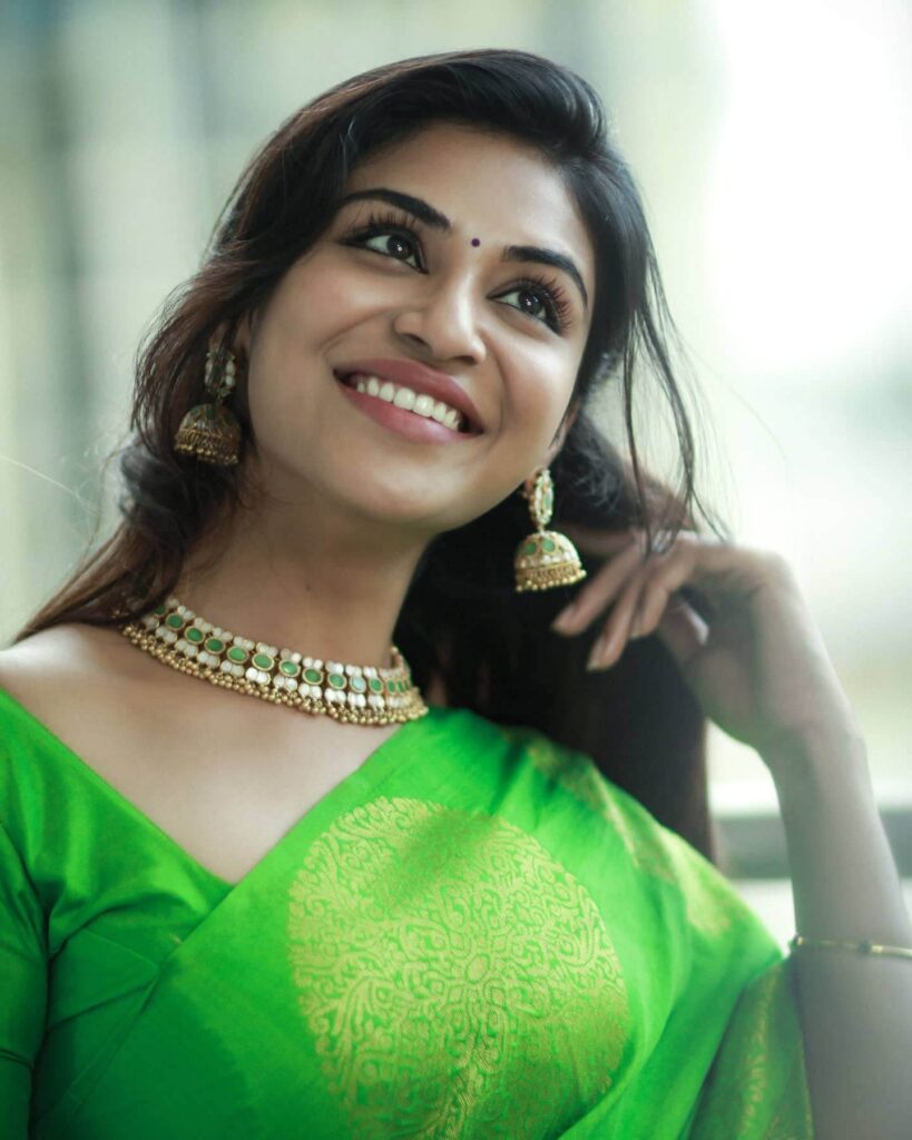 Indhuja Ravichandran close up look in green saree