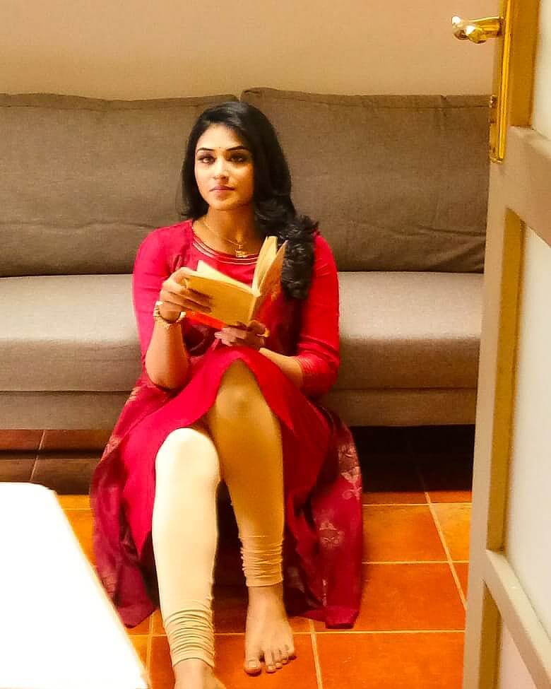 Indhuja Ravichandran in red dress