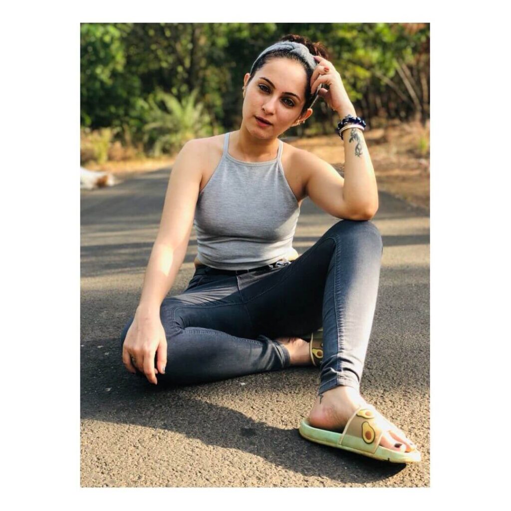 Lavina Tandon sitting in sexy outfit
