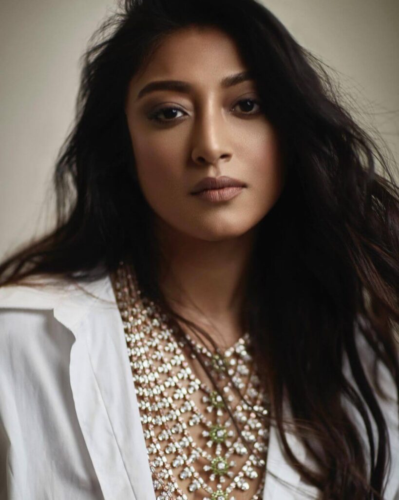Paoli Dam close up shot in white outfit
