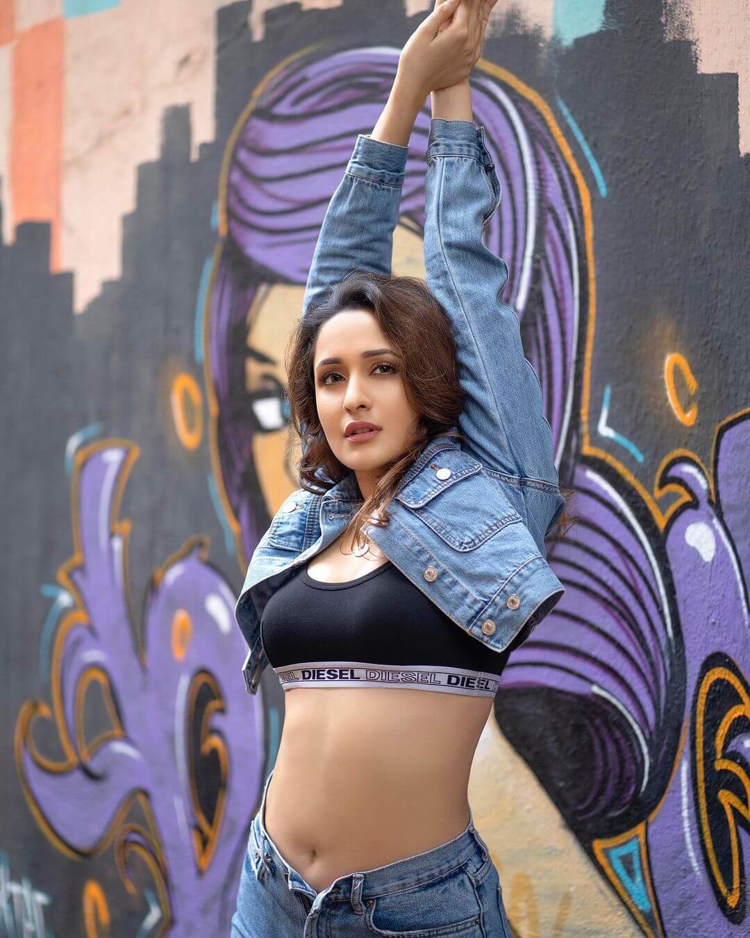 Pragya Jaiswal in sexy black sport bra and blue shorts