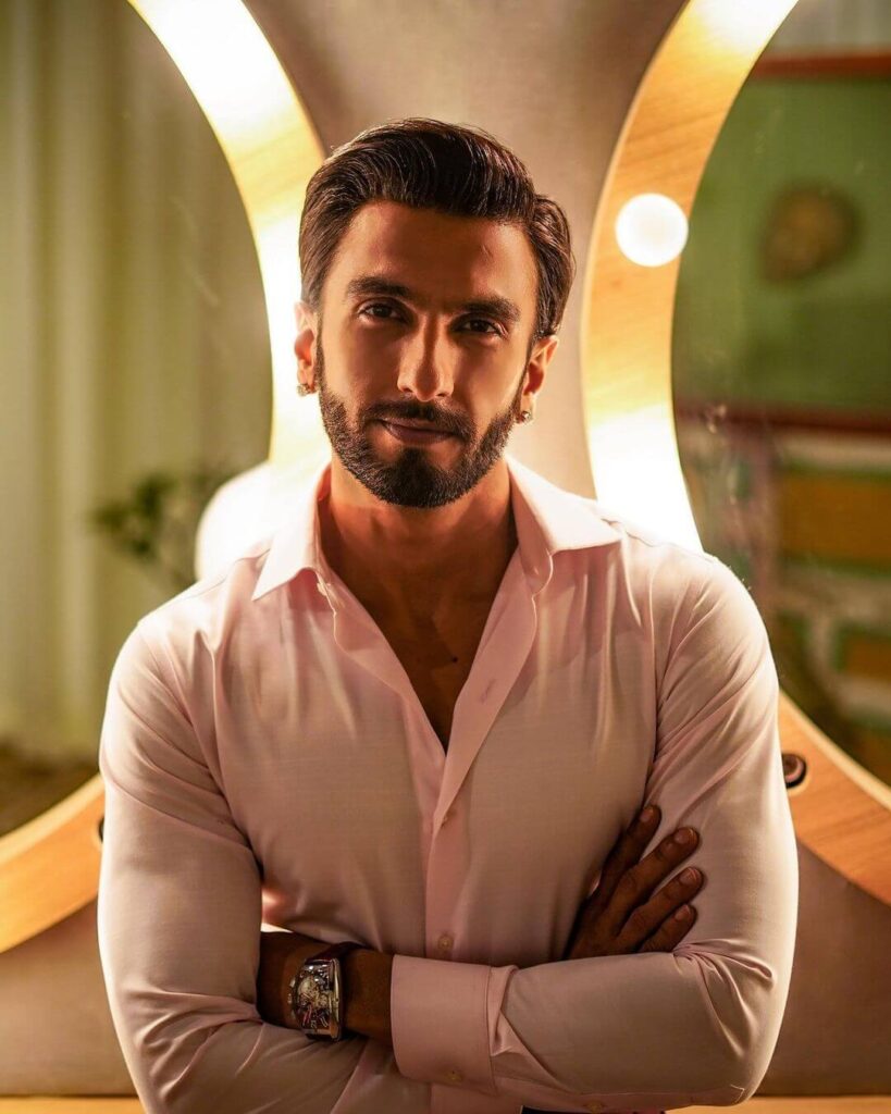 Ranveer Singh close up shot in link pink shirt