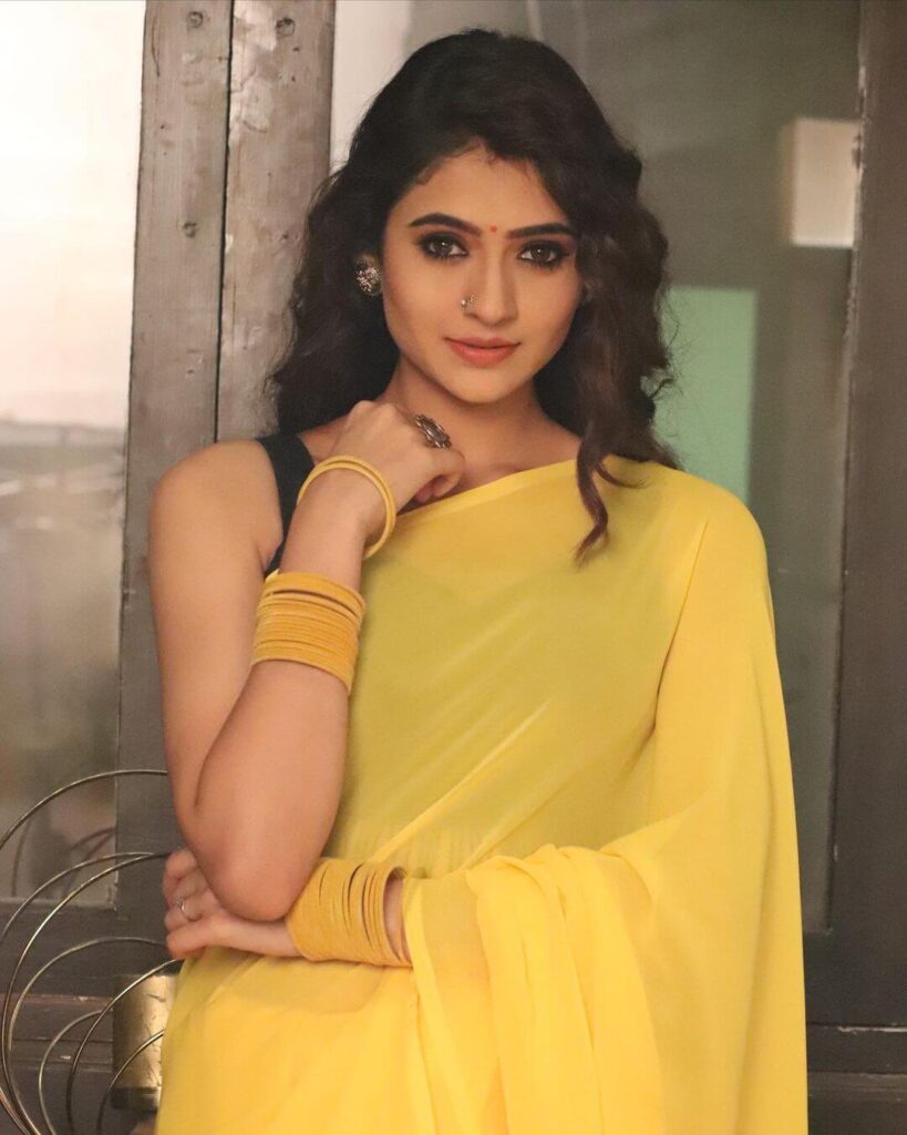 Shivangi Khedkar in yellow saree