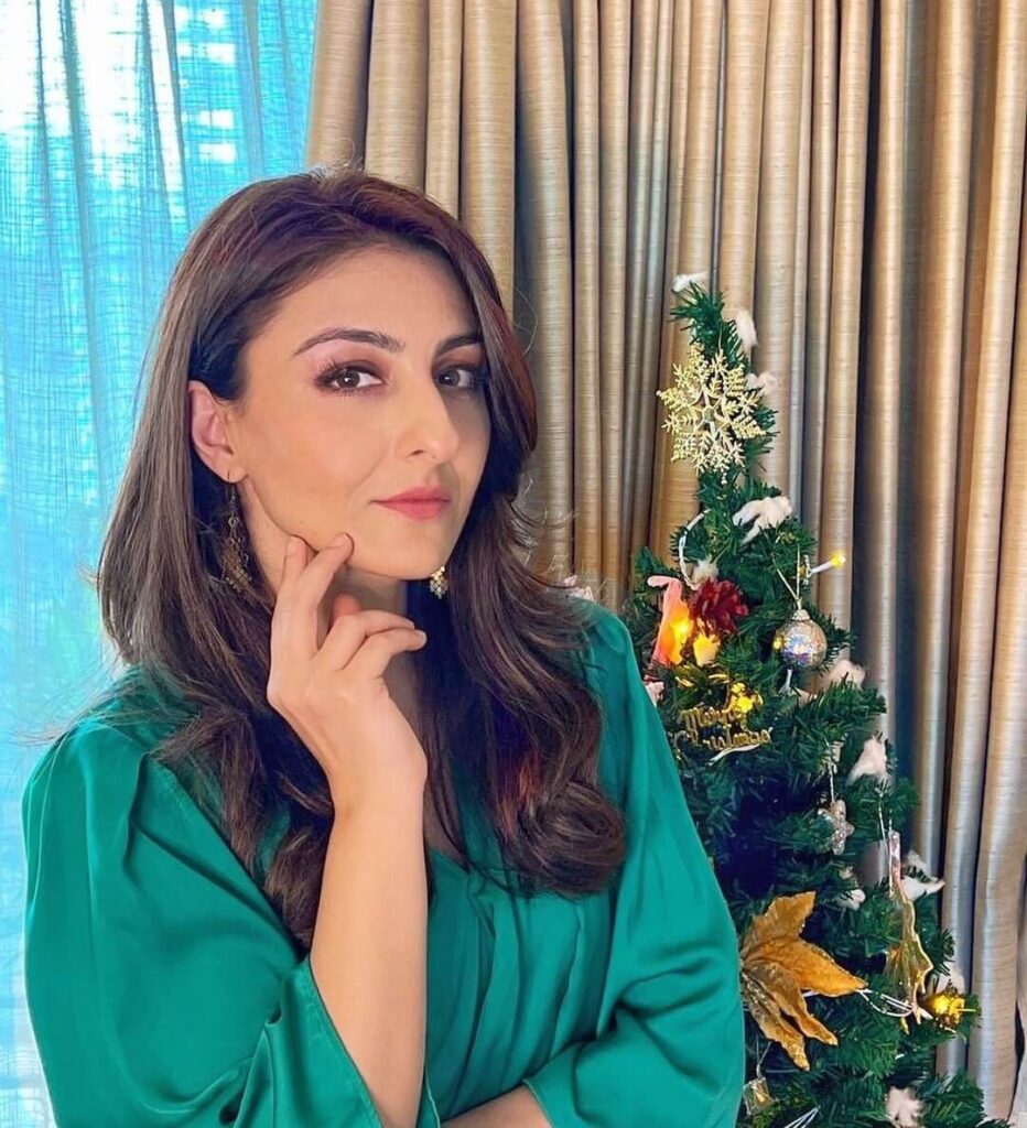 Soha Ali Khan close up shot in cyan color outfit