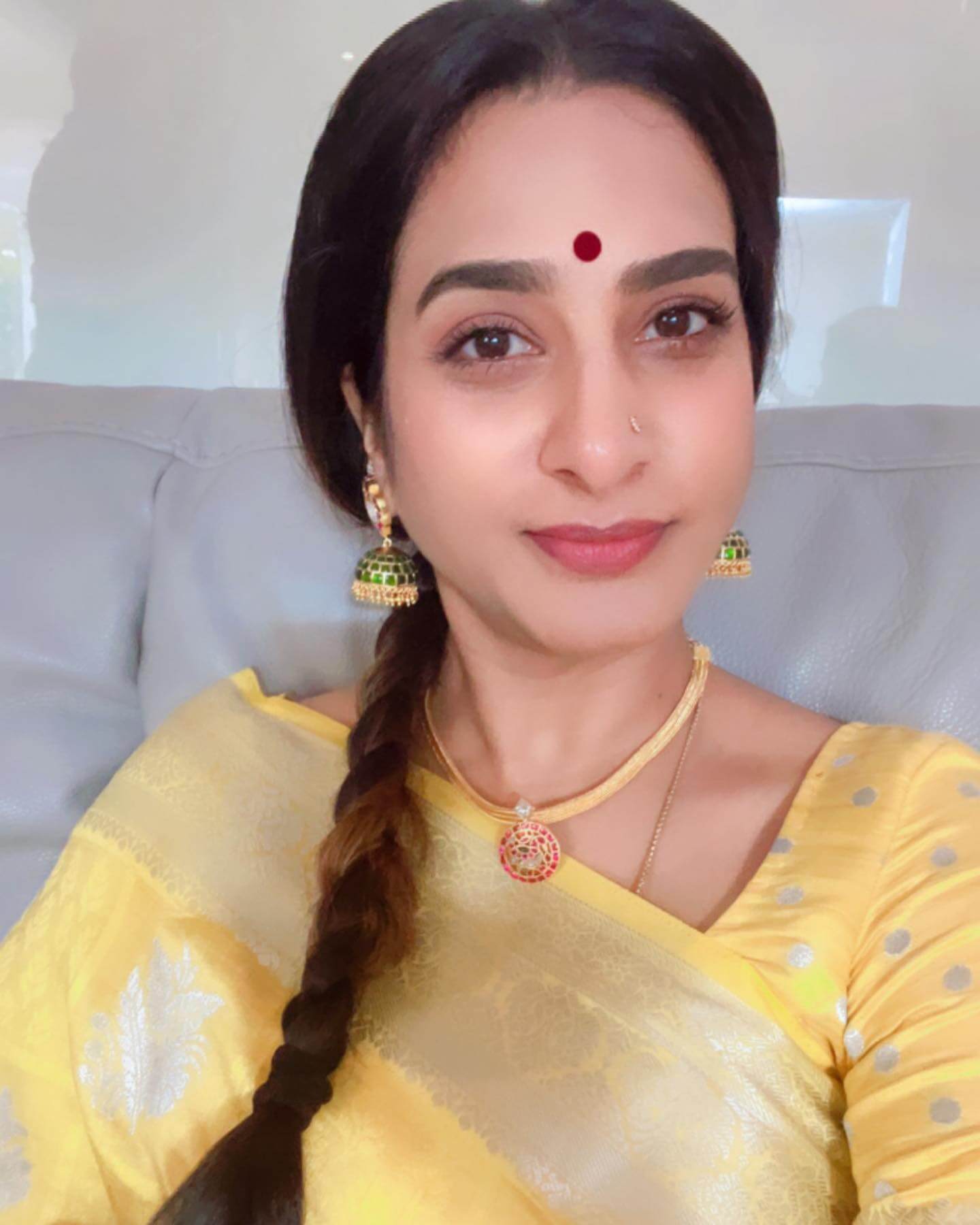 Actress Surekha Vani close up in yellow saree
