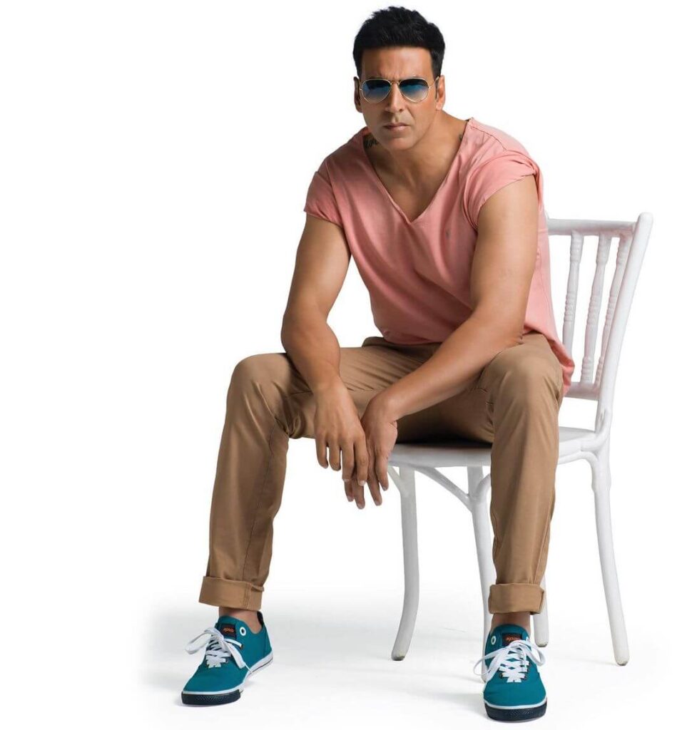 Akshay Kumar sitting in stylish look