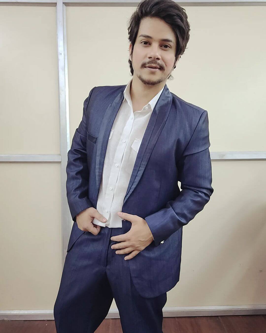 Bhanu Suryam Thakur in stylish suit