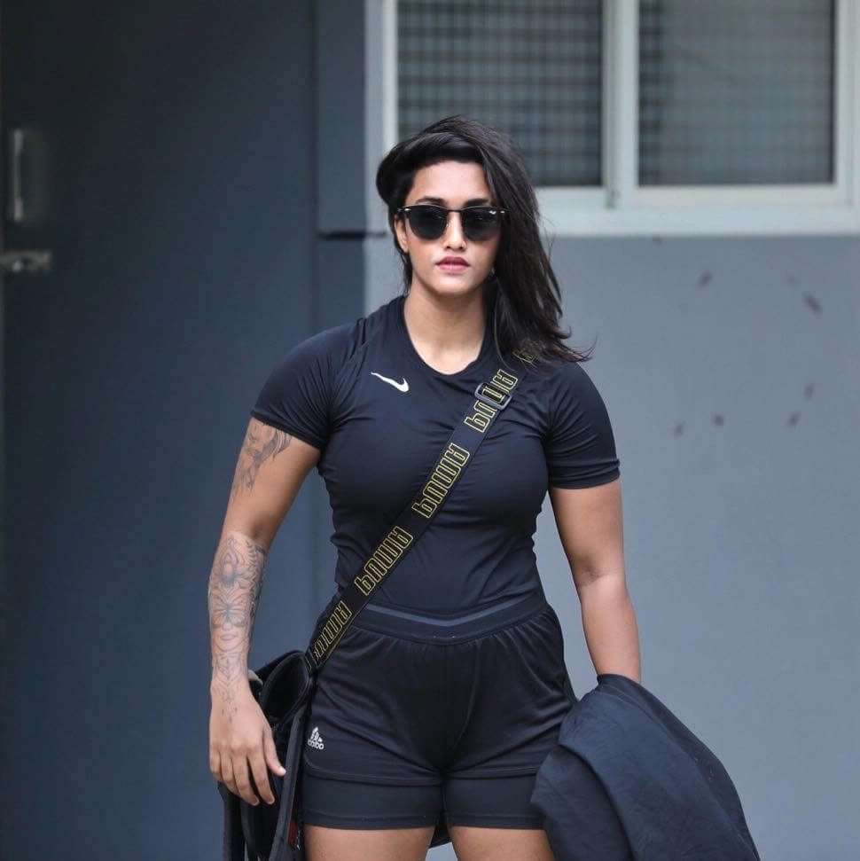 Jasmine M Moosa in workout outfit