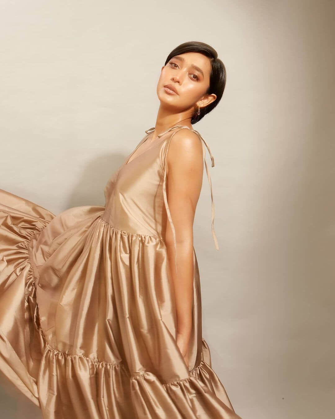 Sayani Gupta in golden color gown