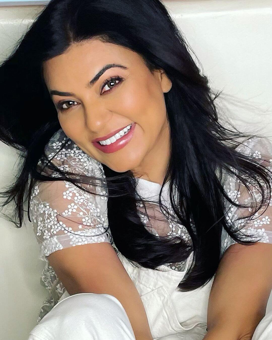 Sushmita Sen face close up shot in white outfit