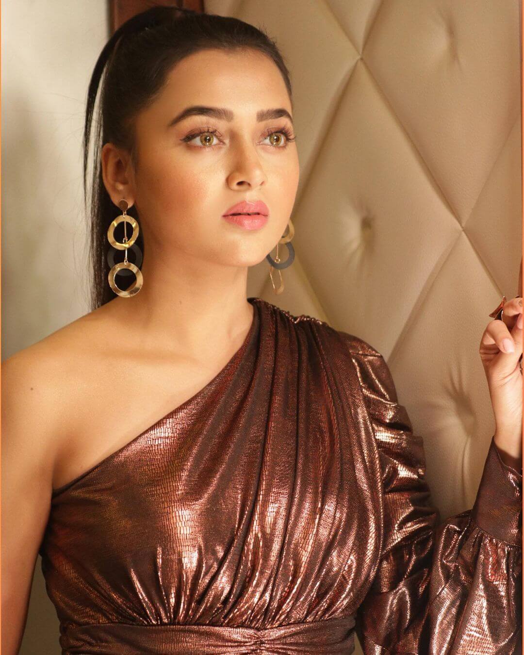 Tejasswi Prakash in glossy out fit close up shot
