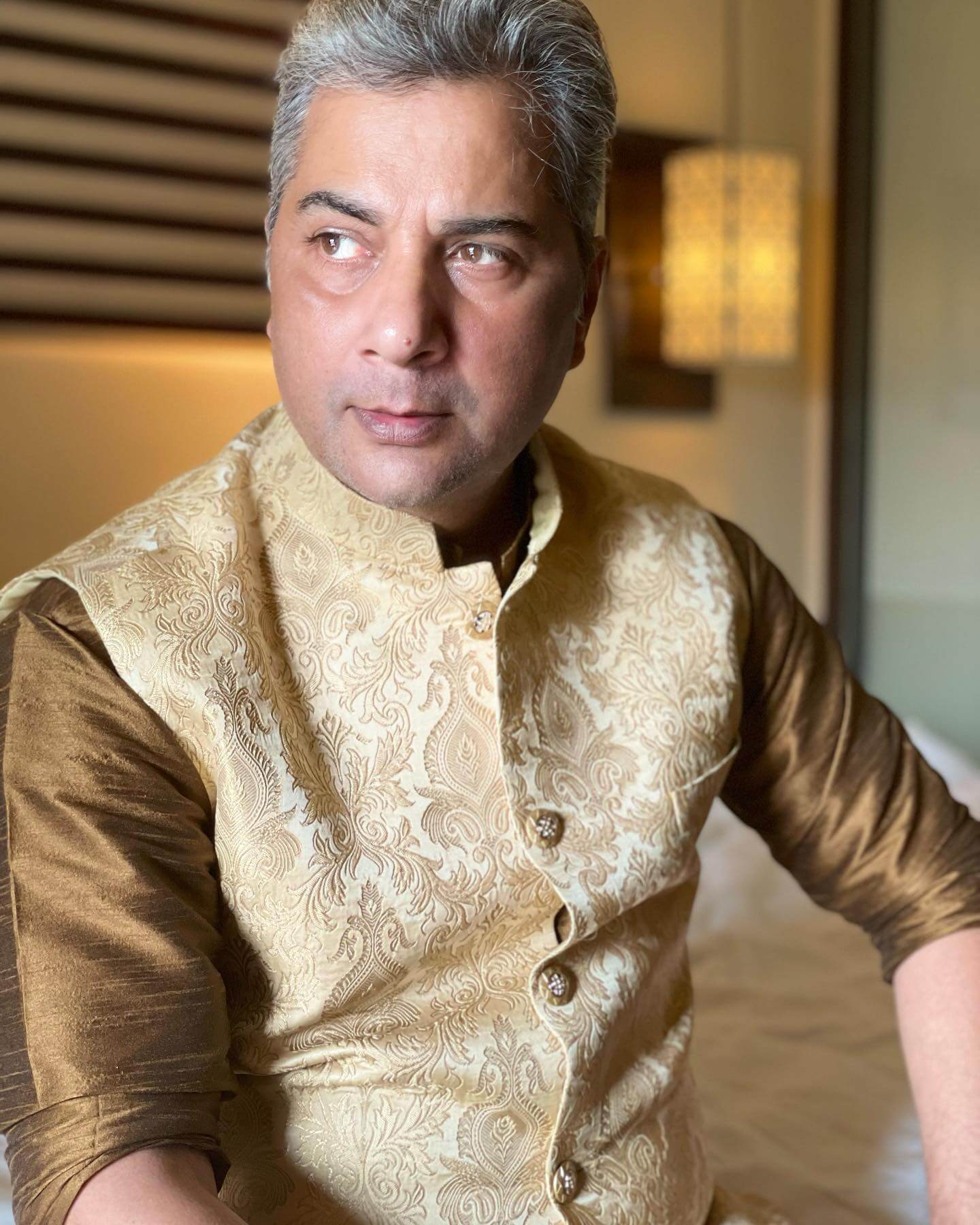 Varun Badola in golden color stylish suit