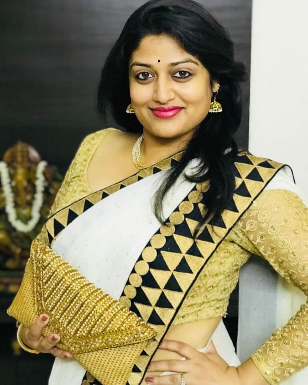 actress Ashrita Vemuganti Nanduri in white saree