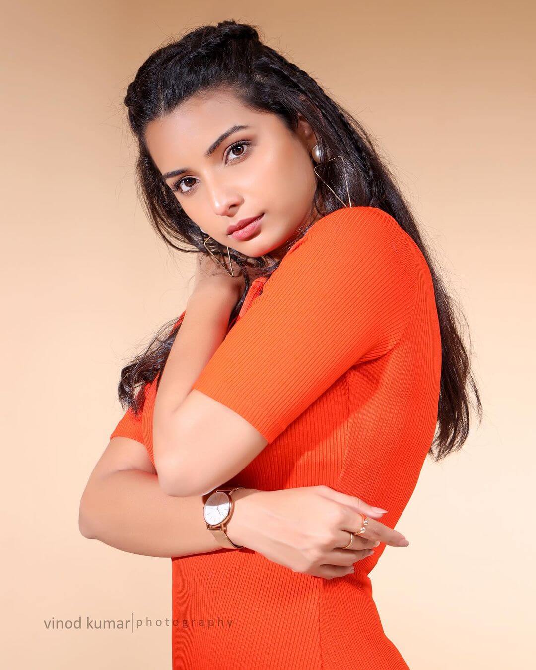 Actress Lavanya in orange outfit