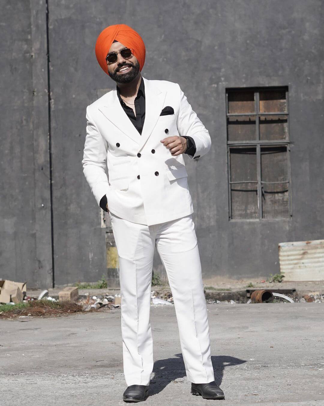 Actor Ammy Virk in white suit
