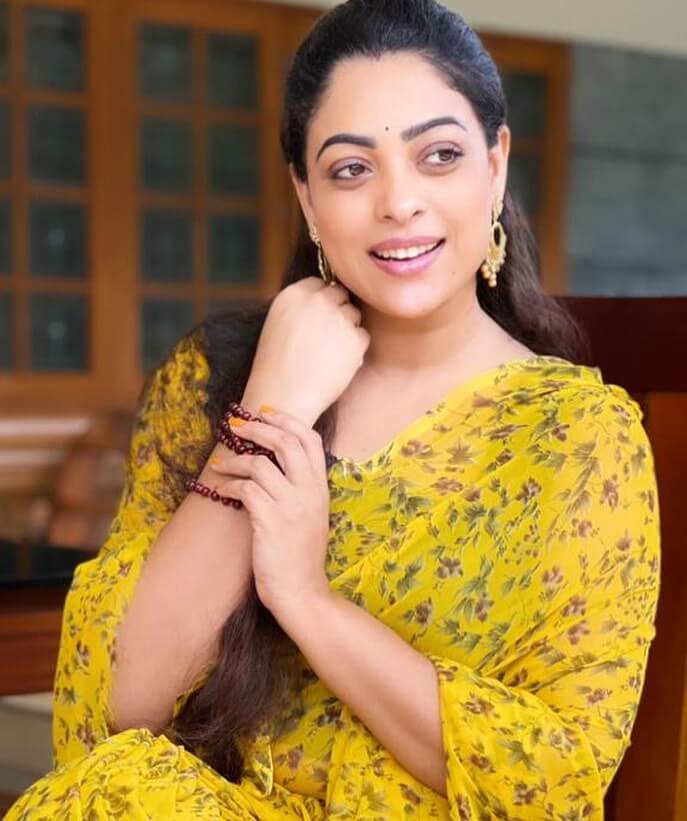 Actress Anjali Rao in yellow outfit