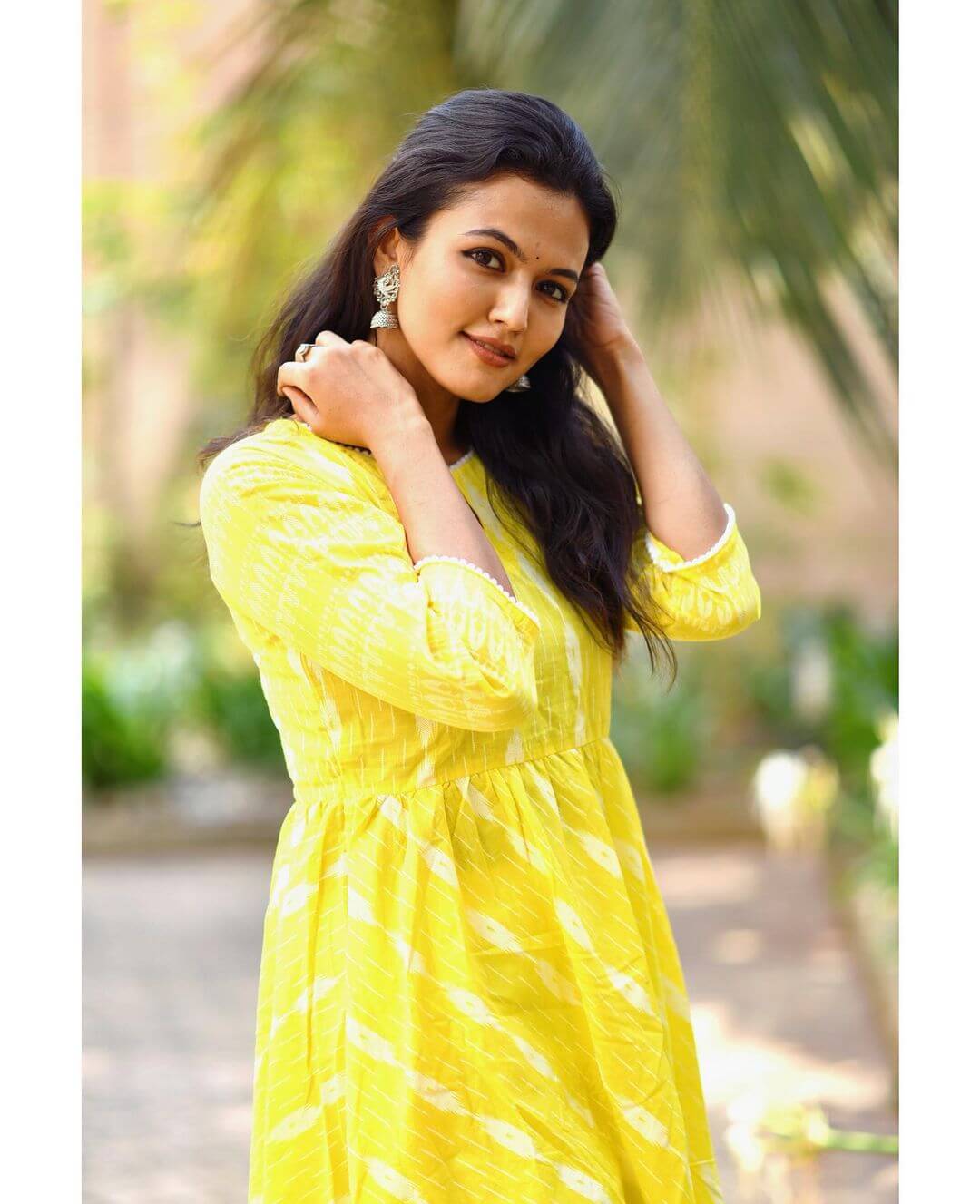 Actress Aparna Das in yellow salwar