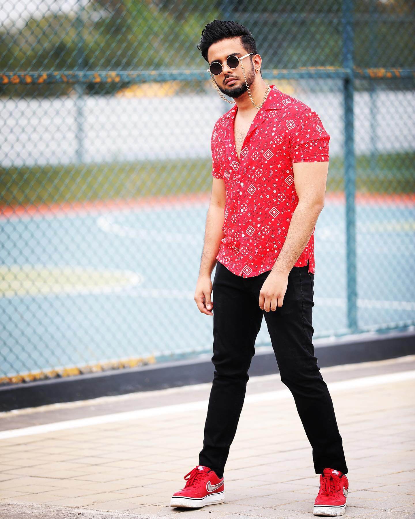 Actor Likith Shetty stylish look in red shirt