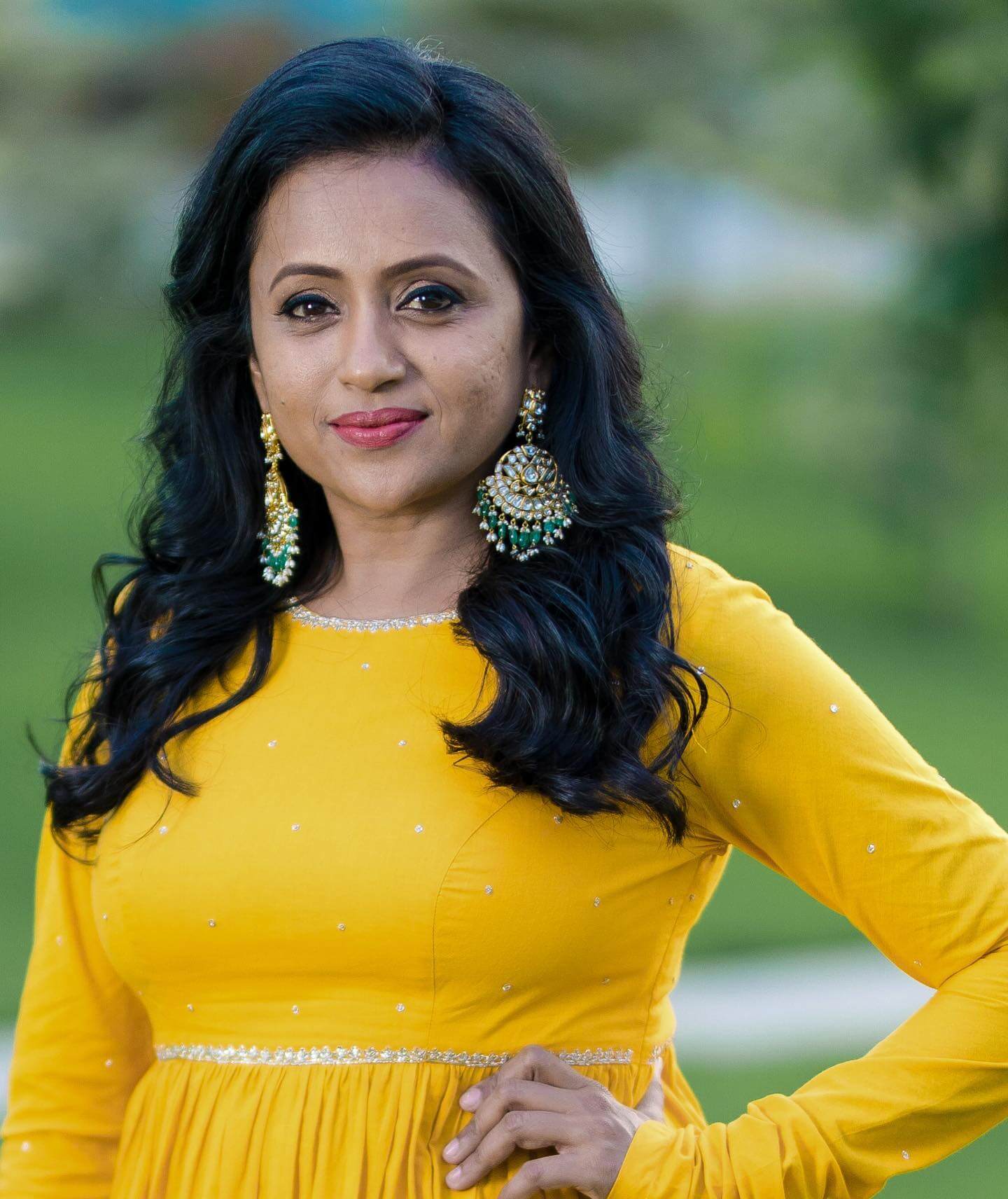 Actress Suma Kanakala in yellow salwar
